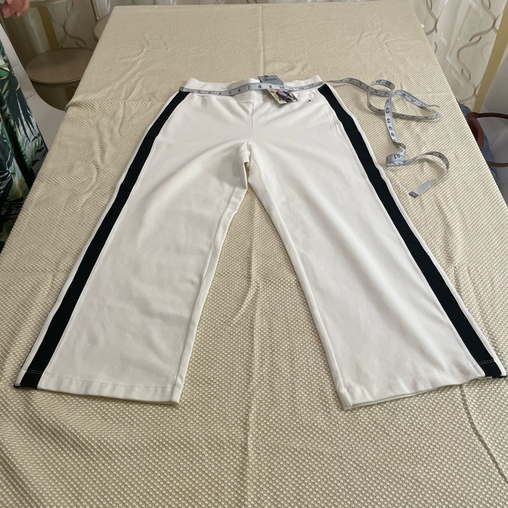 New,DANSKIN  cotton blend , white sport pants, size small.